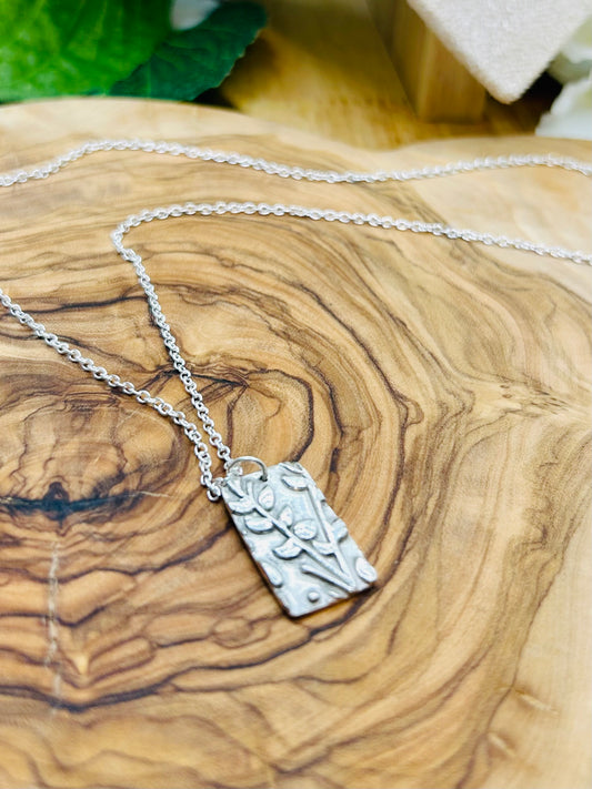 Nature inspired S999 fine silver rectangle shaped, woodland themed necklace with sterling silver chain.
