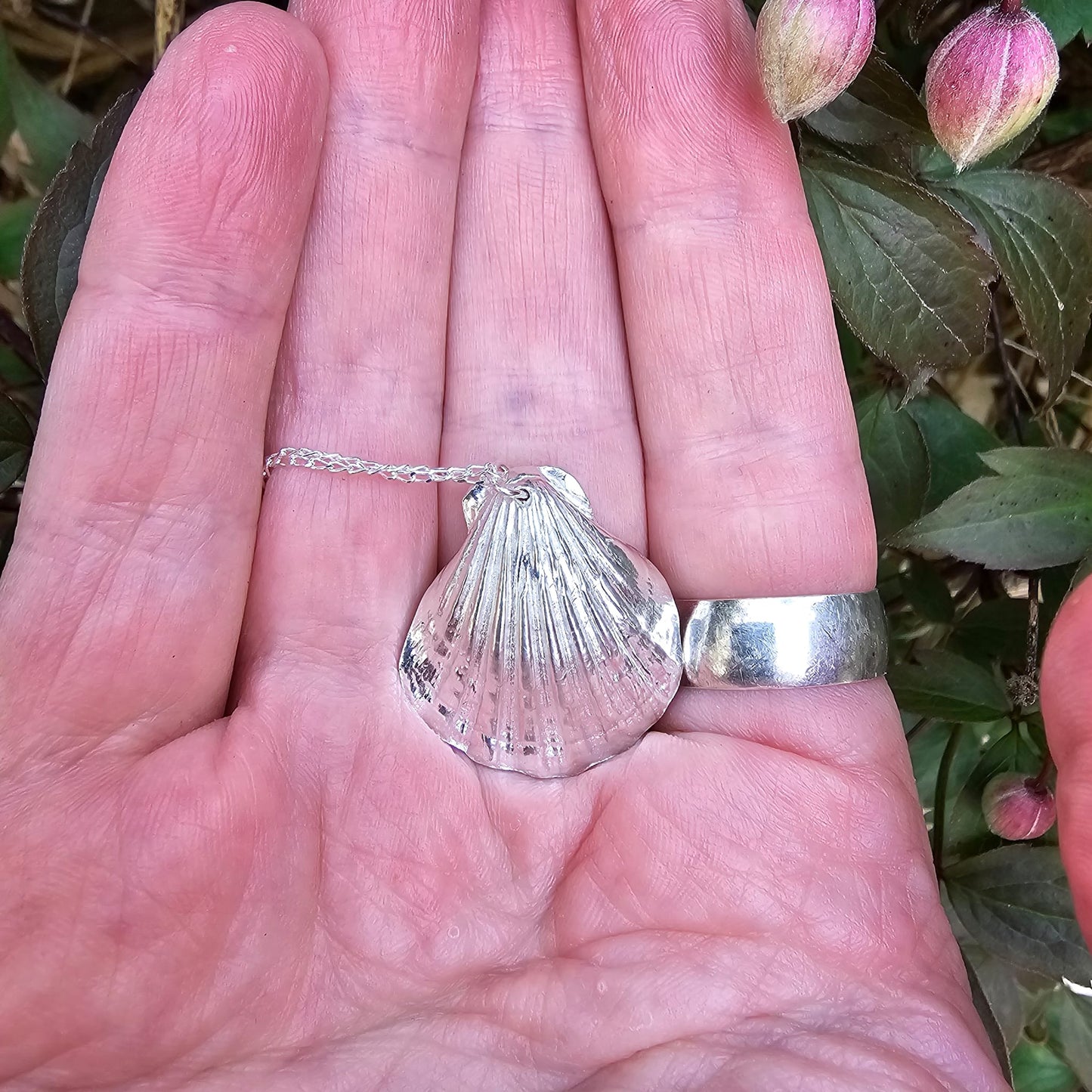 Cockle shell fine silver pendant necklace, markings and impression from a real shell.